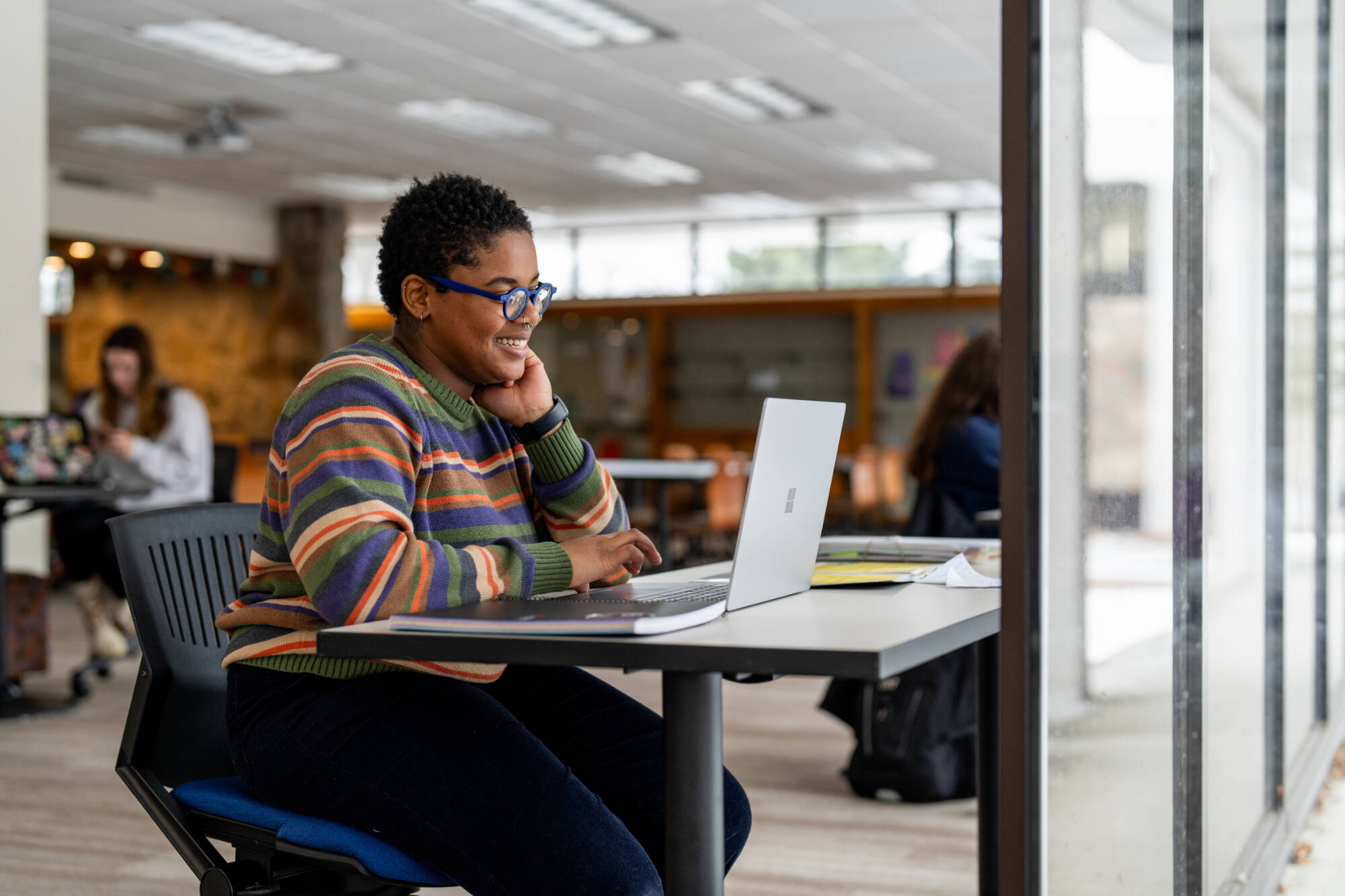 Student working on her laptop